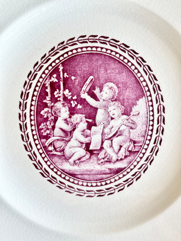wedgwood cipriani dinner plate with detail view of cherub