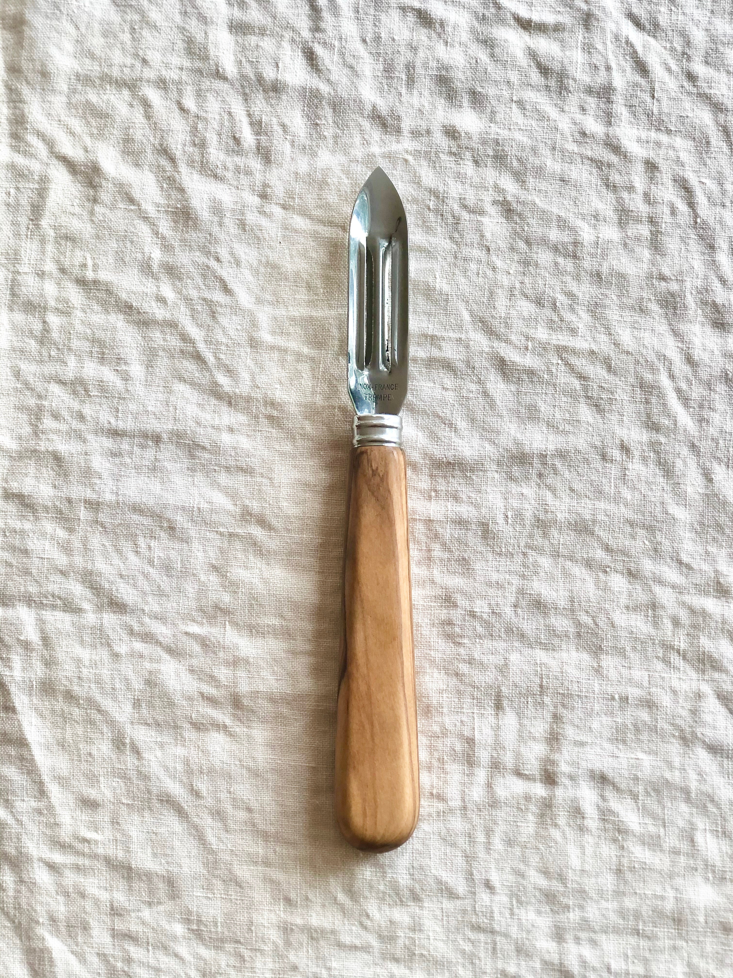 sabre stainless steel peeler with olive wood handles