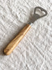 bottle opener with olive wood handle detail view
