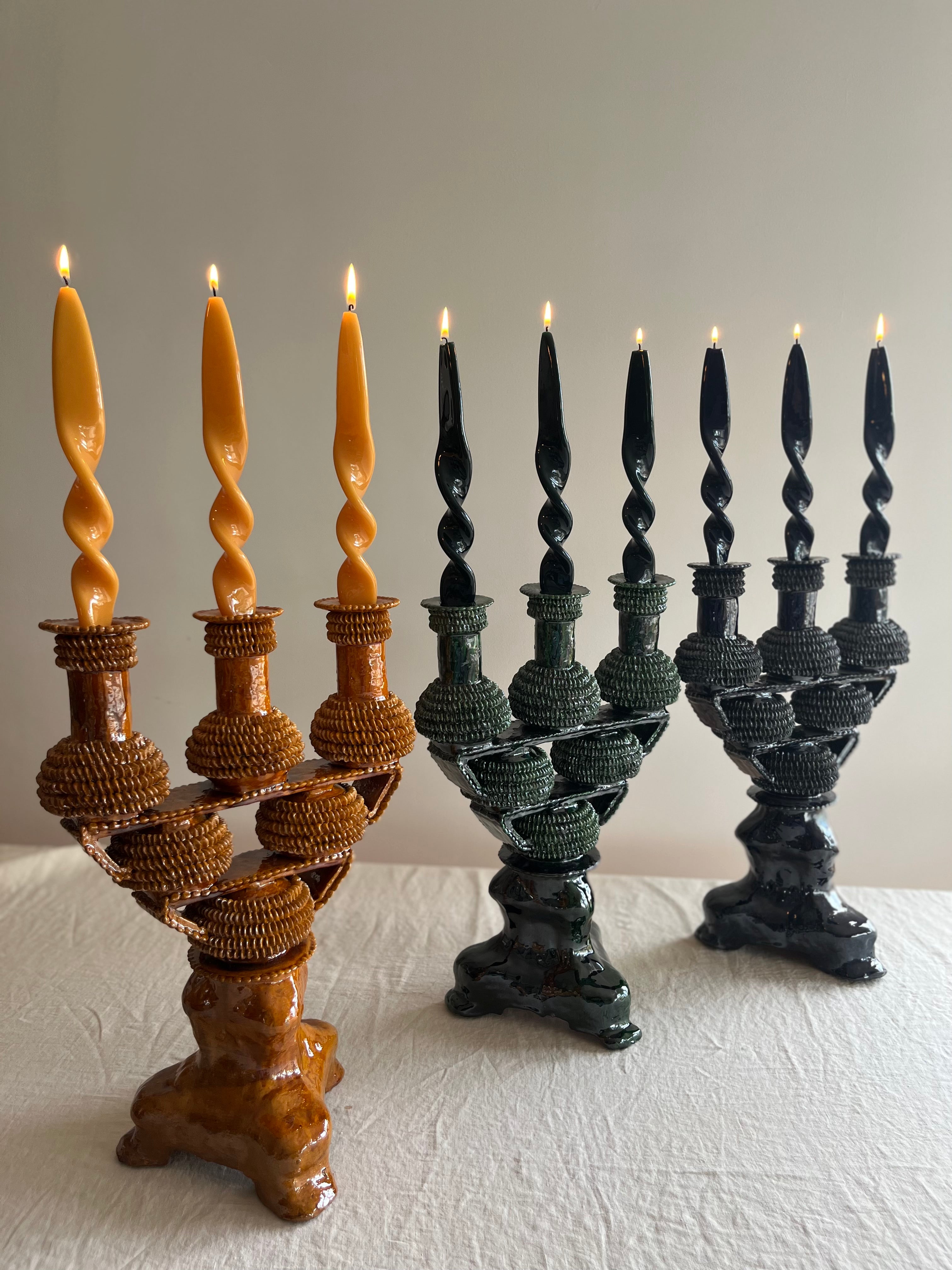 green ceramic candelabra 17.5 inch with flame lit