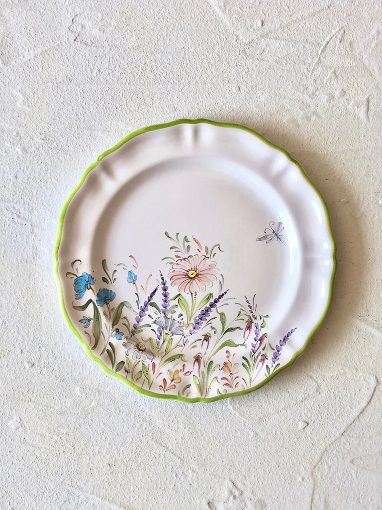 flower salad plates with green edge close up