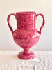 pink amphora vase with raspberry speckle pattern
