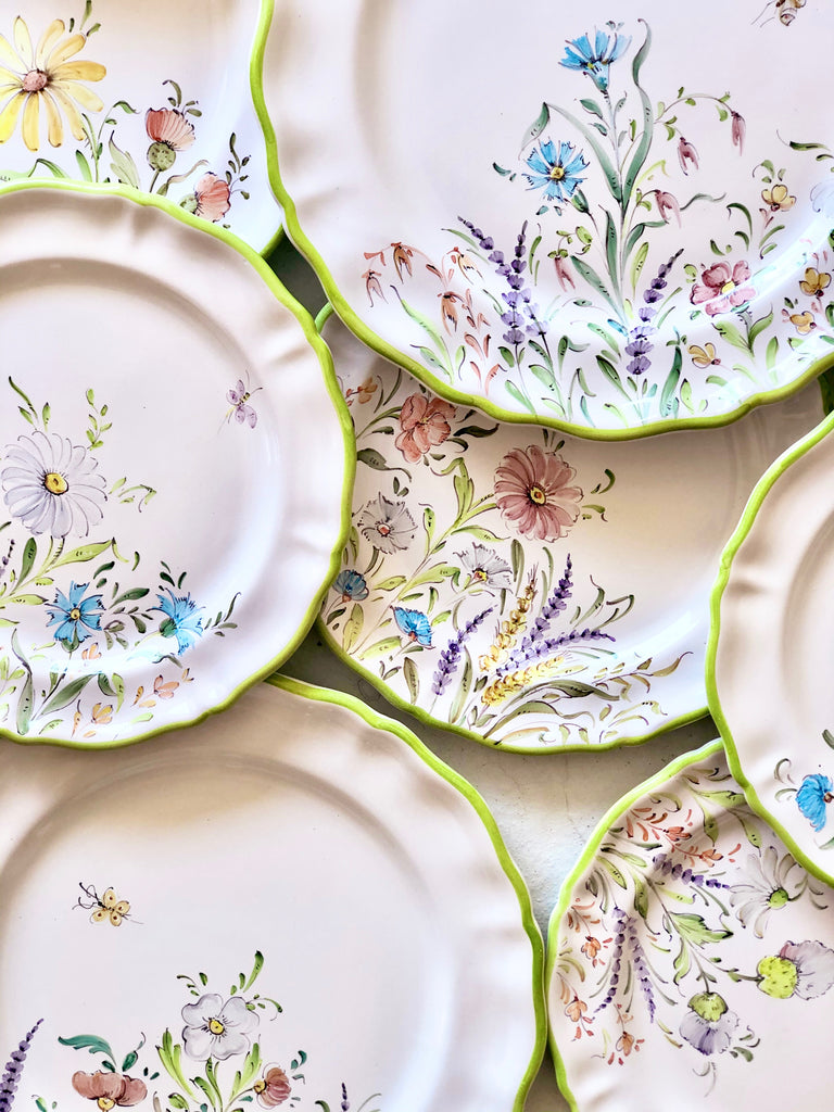 flower salad plates with green edge in group