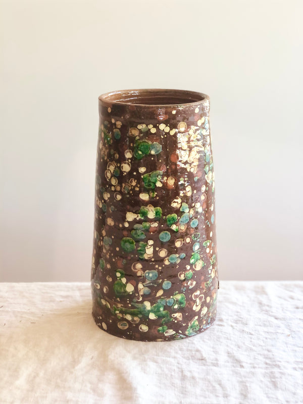 brown cylinder vases with green and cream speckle pattern 8.5 inches tall