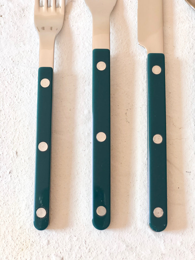 sabre stainless steel flatware set with teal resin handles handle detail view