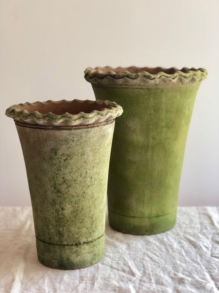 moss covered terra cotta pot for plants