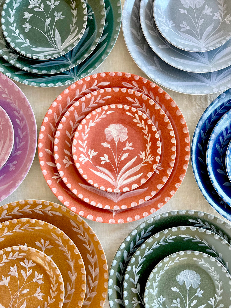 Porcelain Dinner Plates stacked in assorted colors