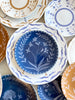 blue dinner plate with hand painted white floral design with other color options