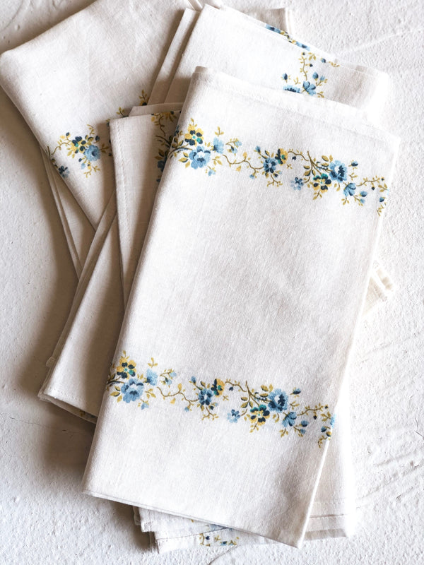 white linen napkins by d'ascoli with blue floral stripes 20 inches