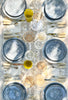 blue dinner plate with white floral pattern in tablescape