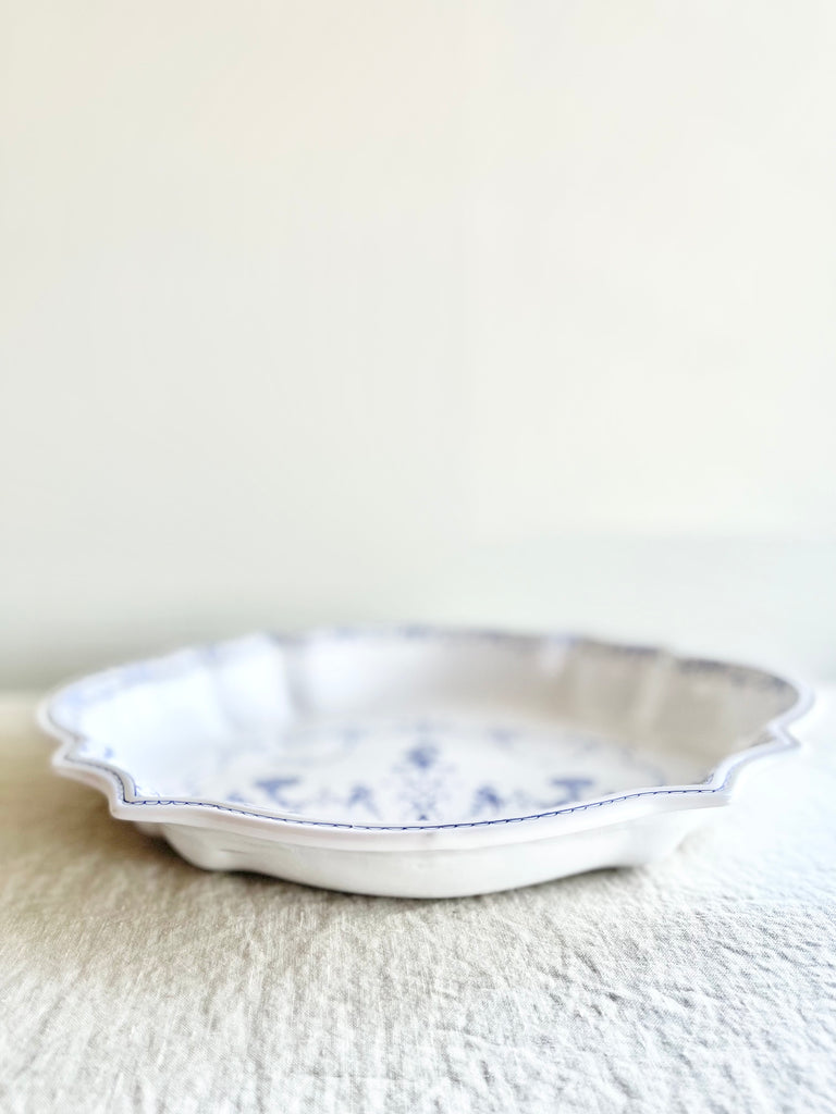 hand painted faience blue and white platter side view