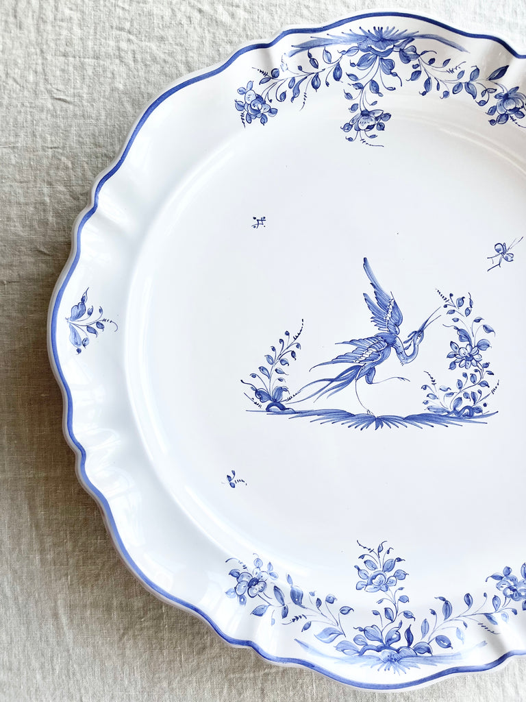 white serving tray with blue phoenix design rim view