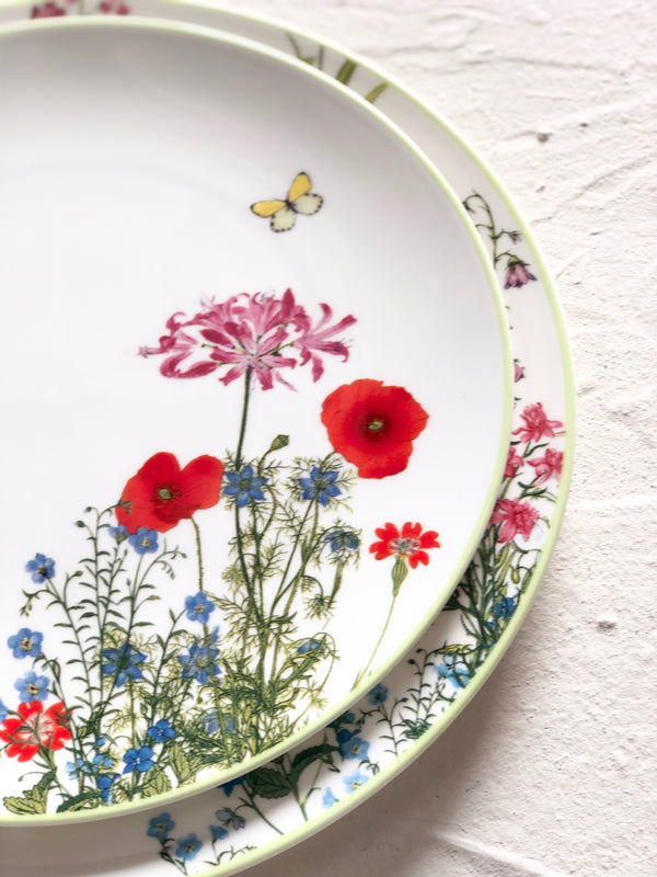 white porcelain dinner plate with wildflowers detail view