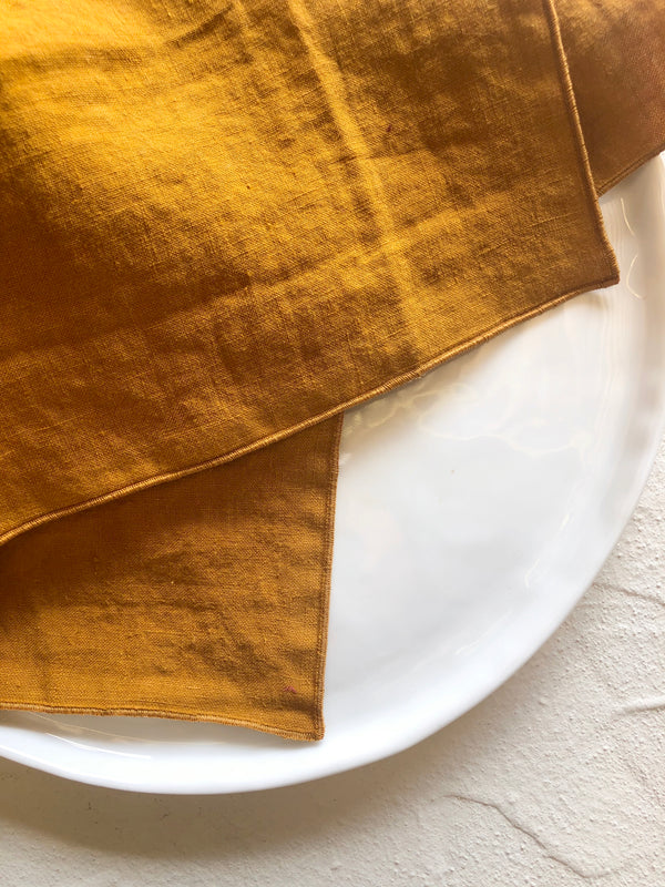 linen napkins 18 inch mustard color top view