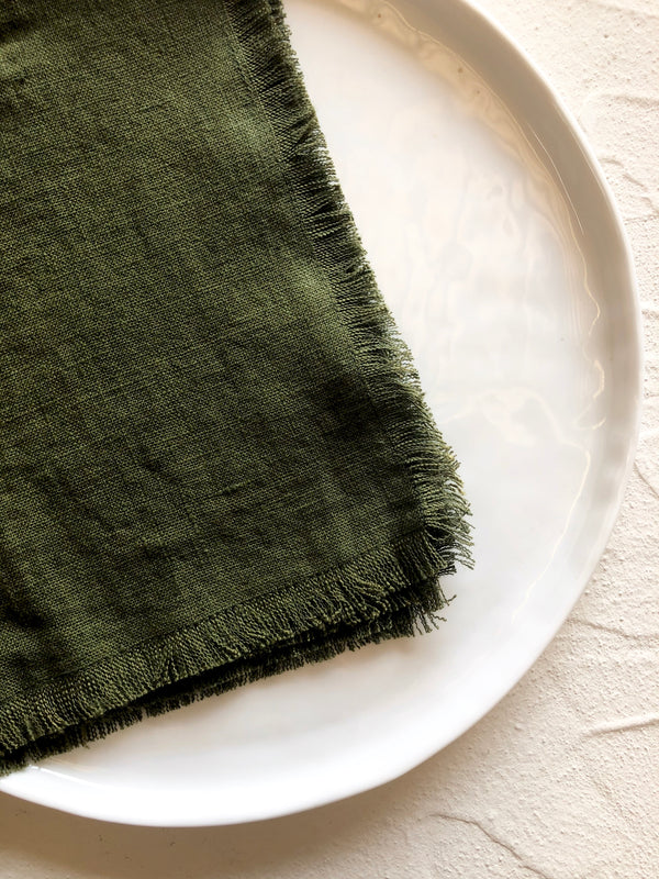 raw edge linen napkins dark forest green detail