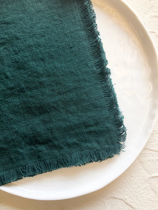 linen napkins with raw edge in teal