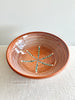 large pasta bowl with radial leaf design portocale color detail view