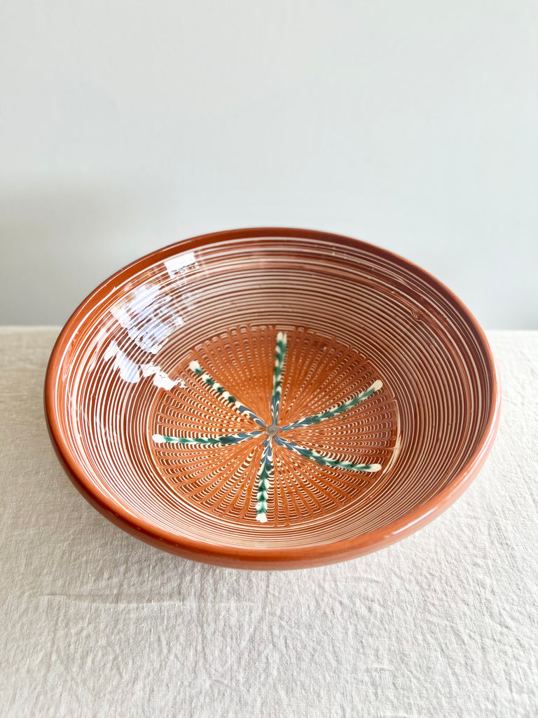 large pasta bowl with radial leaf design portocale color detail view