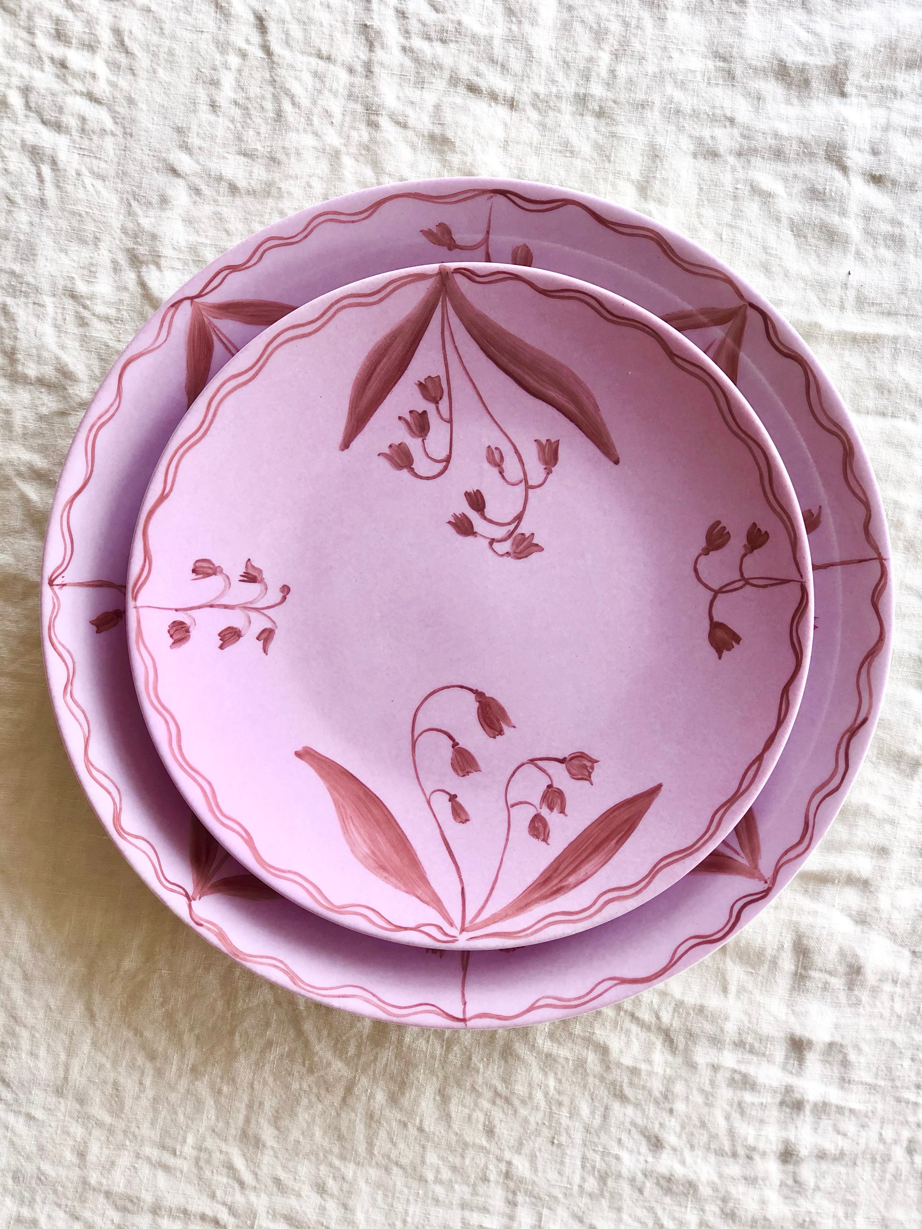 pink salad plate with red floral design 8.5 inch stacked