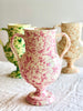 cream amphora vase with pink speckle pattern 13 inches tall in group with other color options