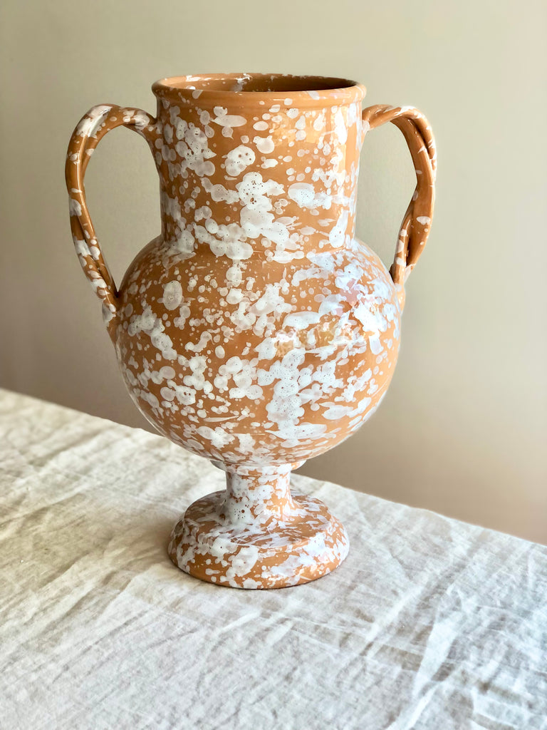amphora vase in terracotta and cream speckle pattern detail view
