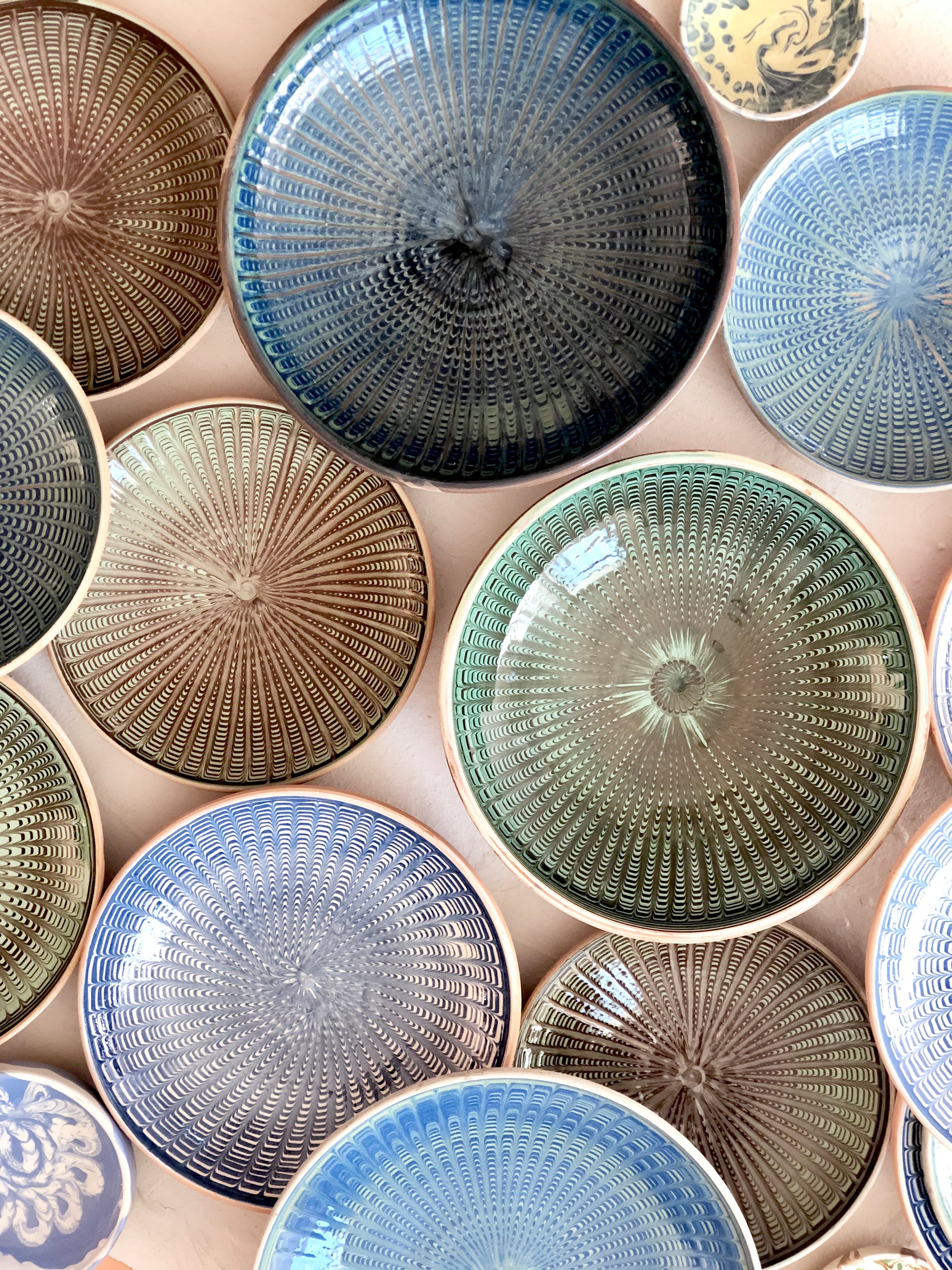 teal and green salad plate with radial peacock pattern with other color options