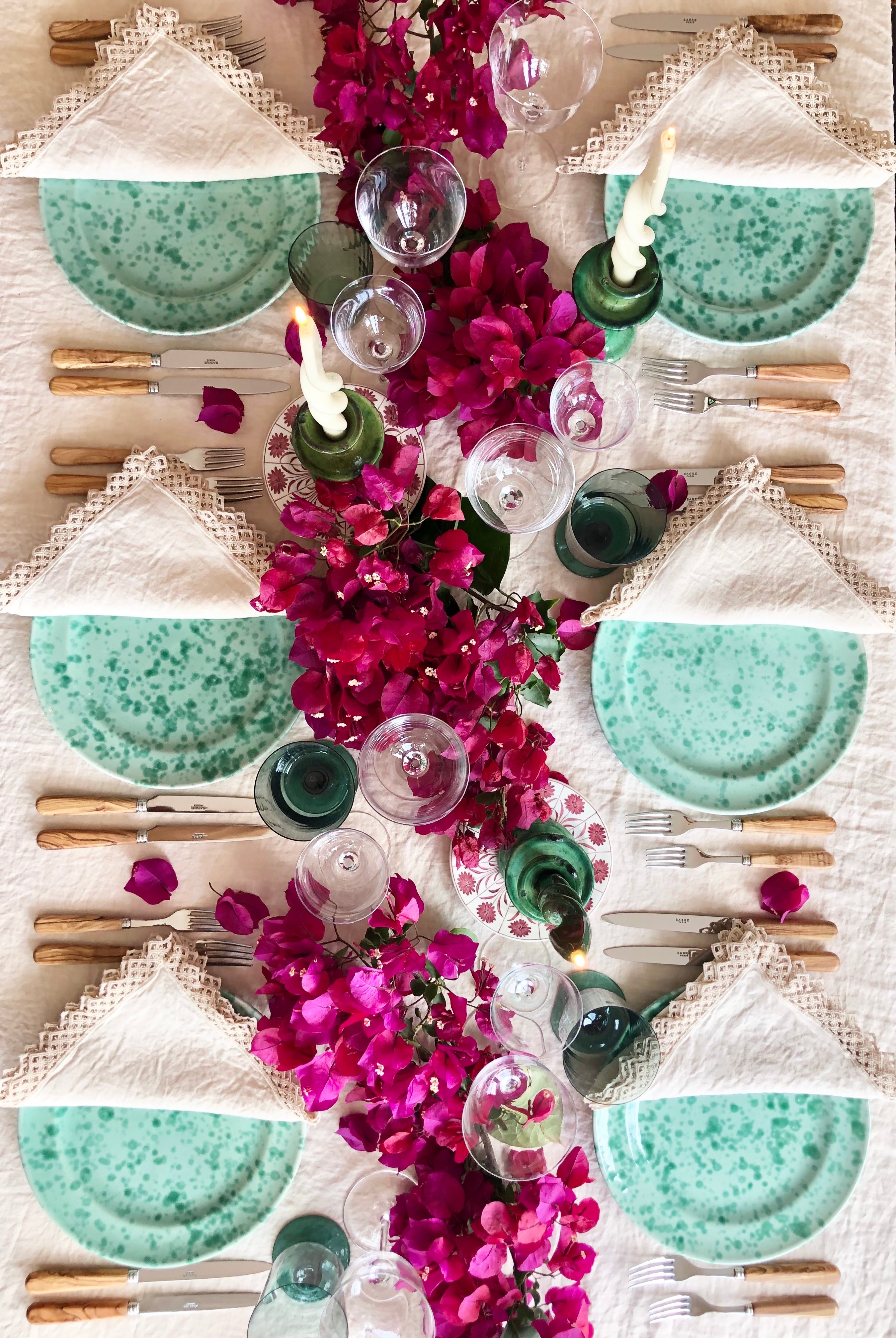 cream linen napkins with macrame trim in tablescape top view