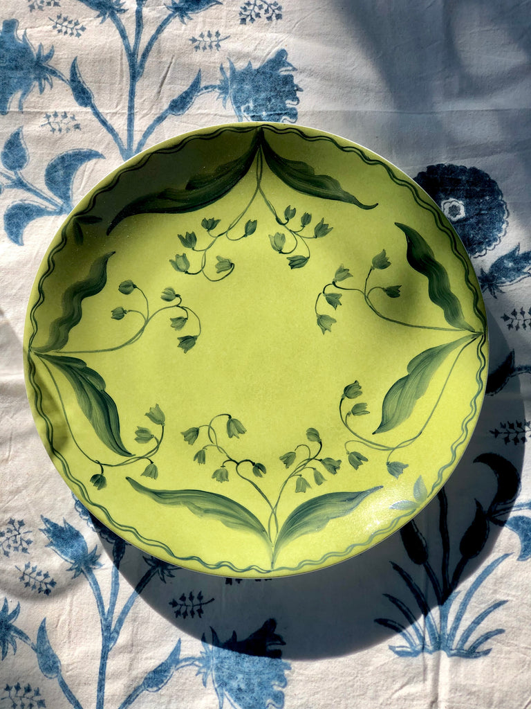 lime dinner plate with green floral design 10.5 inch close up in natural light
