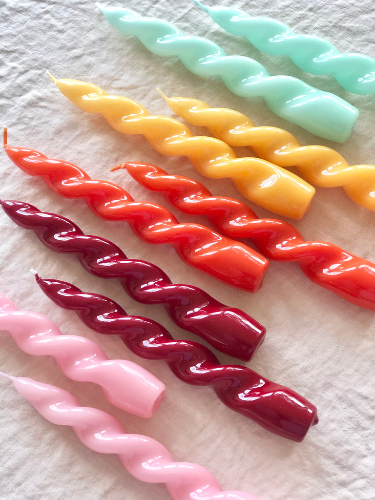 pink twisted taper candles with other colors