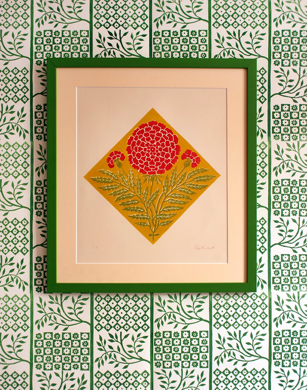 ellen merchant limited edition print with green background and large yellow Marigold 13.7" x 19.6" hanging on wall
