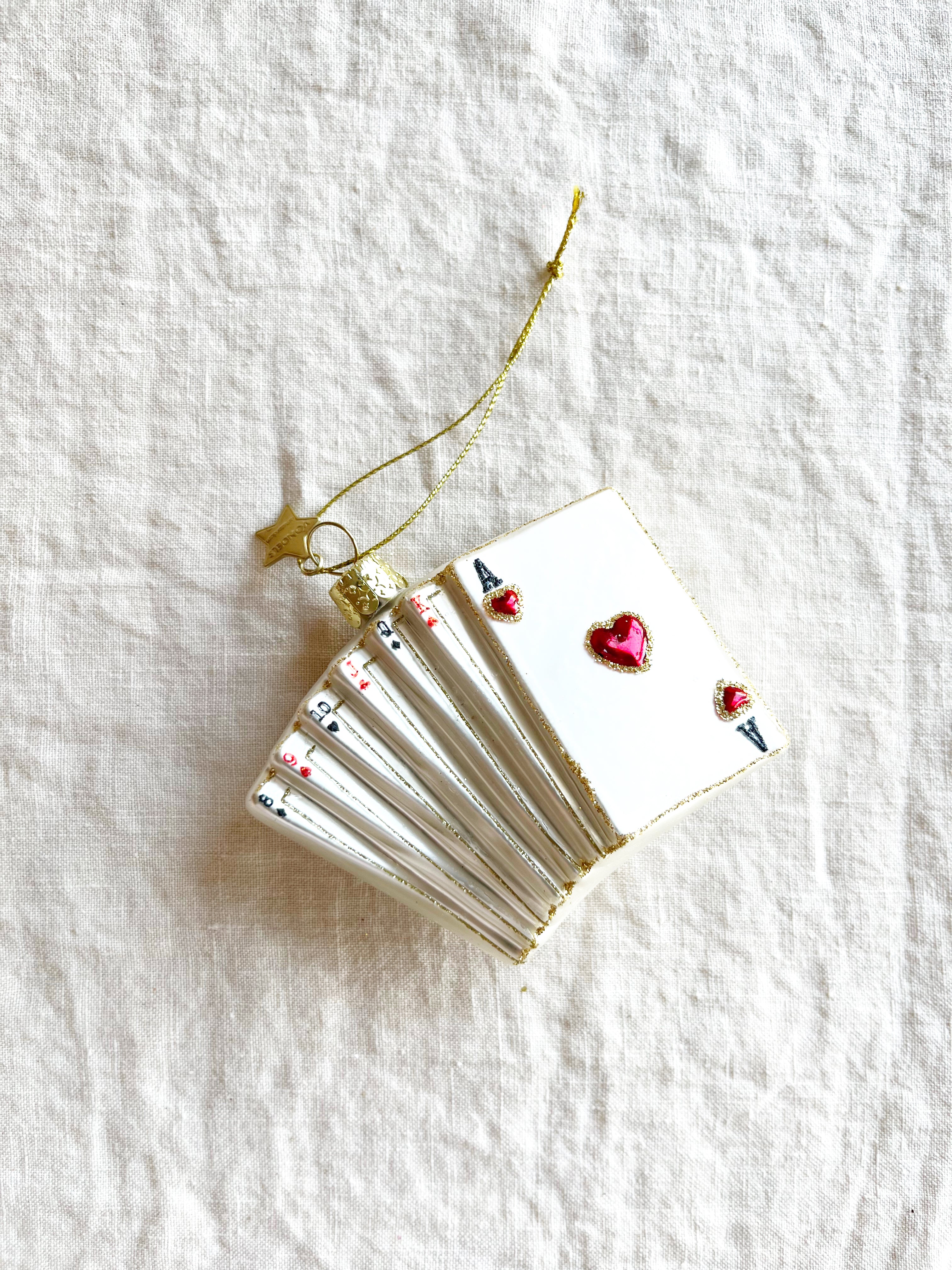 glass christmas ornament shaped like playing cards