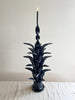 blue taper candle holder shaped like the top of a pineapple 16.6 inches tall with taper candle
