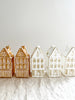 glass christmas ornament shaped like gingerbread house with step gable canal house ornament
