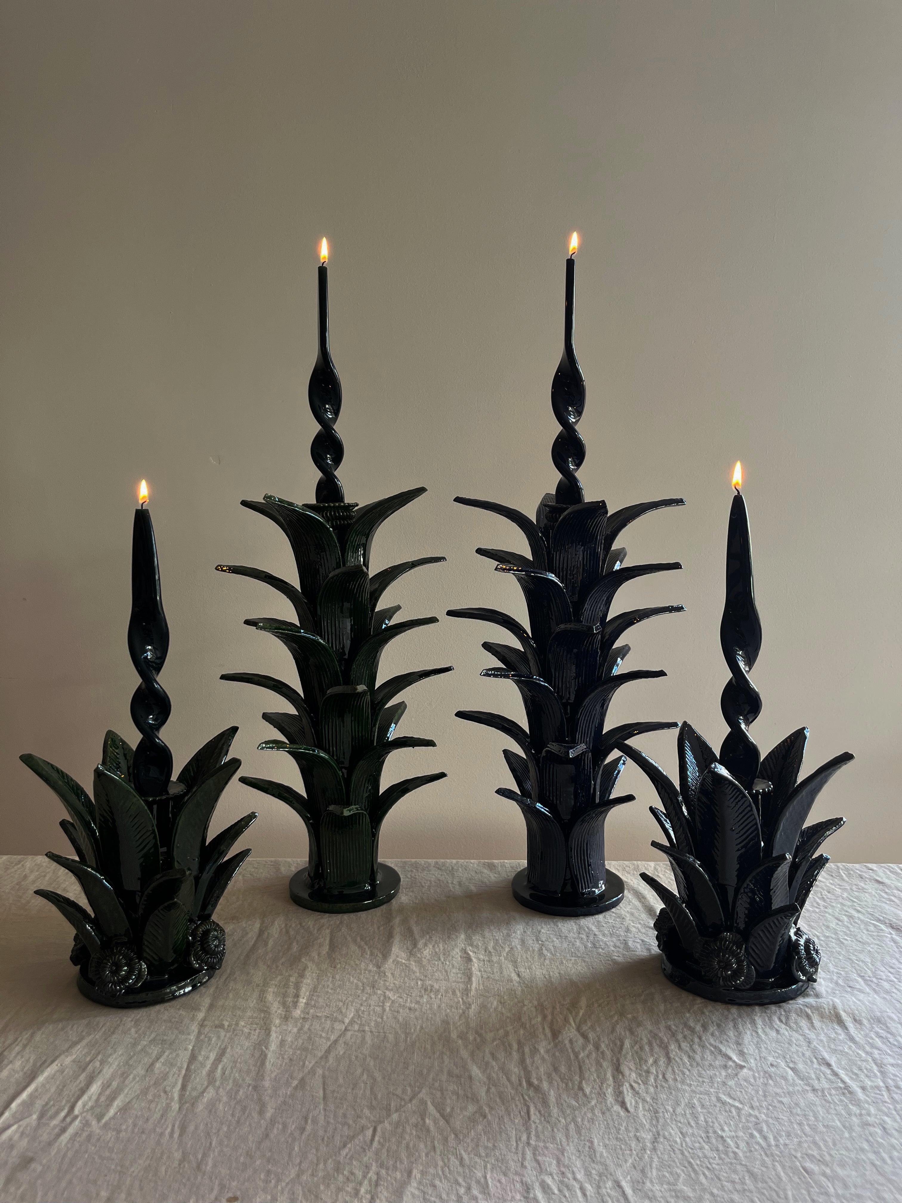 blue taper candle holder shaped like the top of a pineapple 16.6 inches tall show with other size options