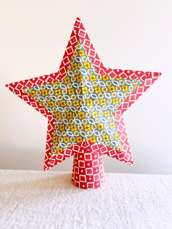 star tree topper with gold sunflower pattern