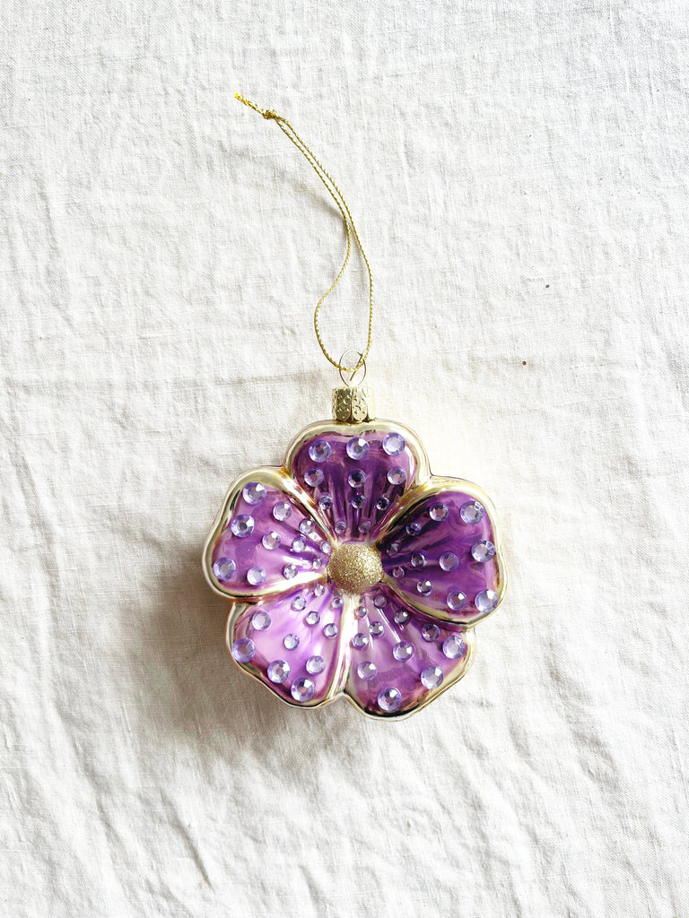flower shaped glass christmas ornament in lavender