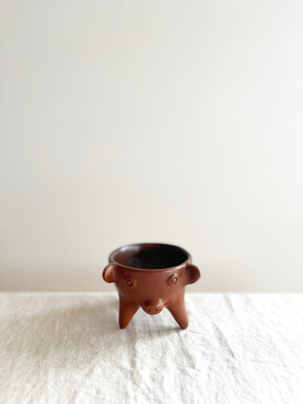 brown piggy salsa bowl with three feet