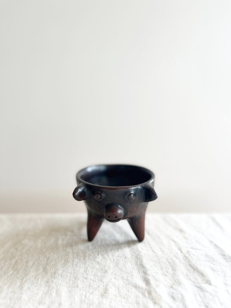 brown piggy salsa bowl with three feet front detail view