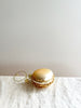 gold macaroon glass christmas ornament side view