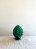 cereria introna pinecone paraffin wax candle green on white linen