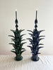 green taper candle holder shaped like the top of a pineapple 16.6 inches tall in group of two