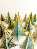 decorative paper christmas tree stands in green marbled pattern group of many in both sizes