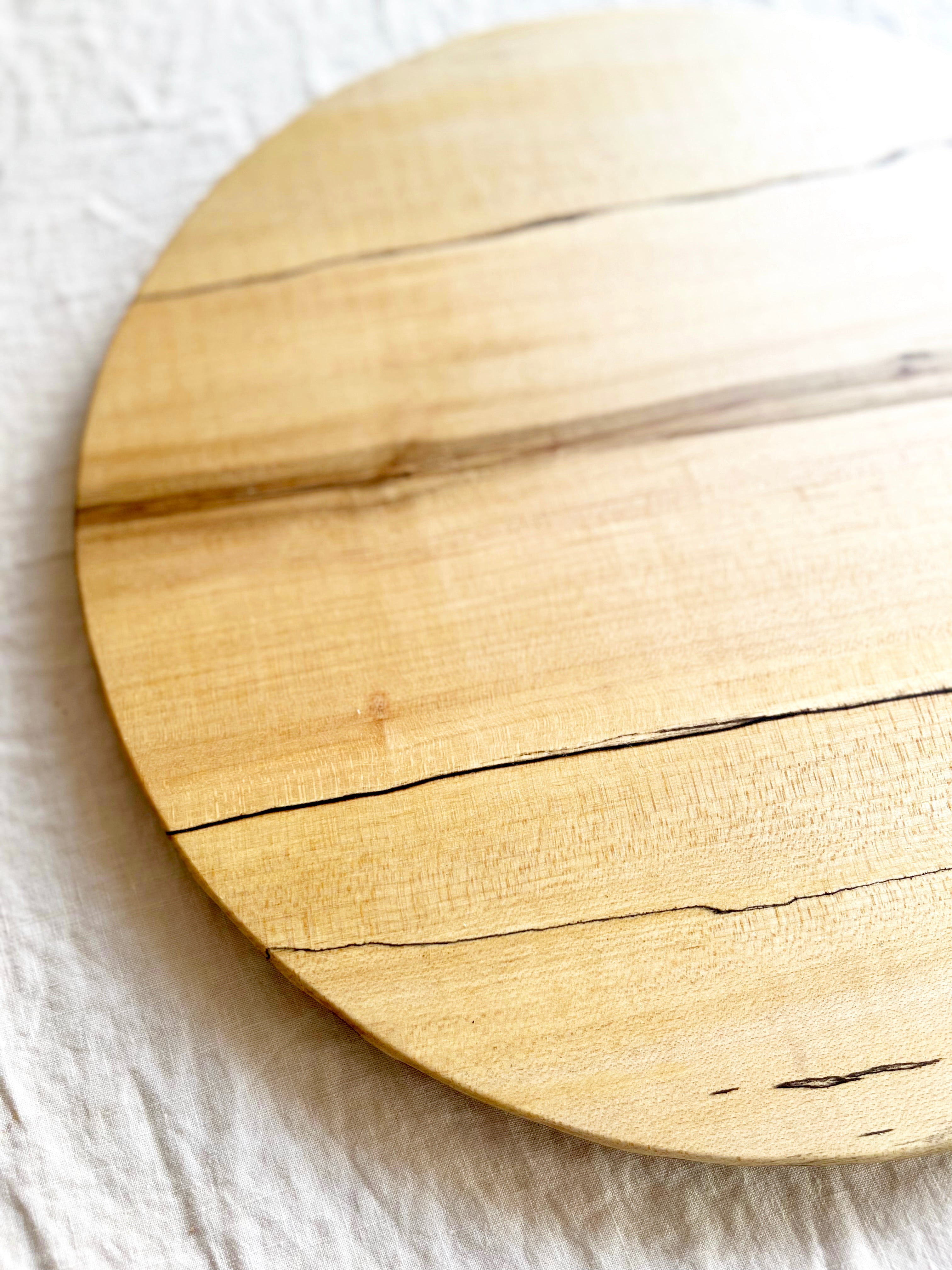 spalted maple wood cutting board angle view