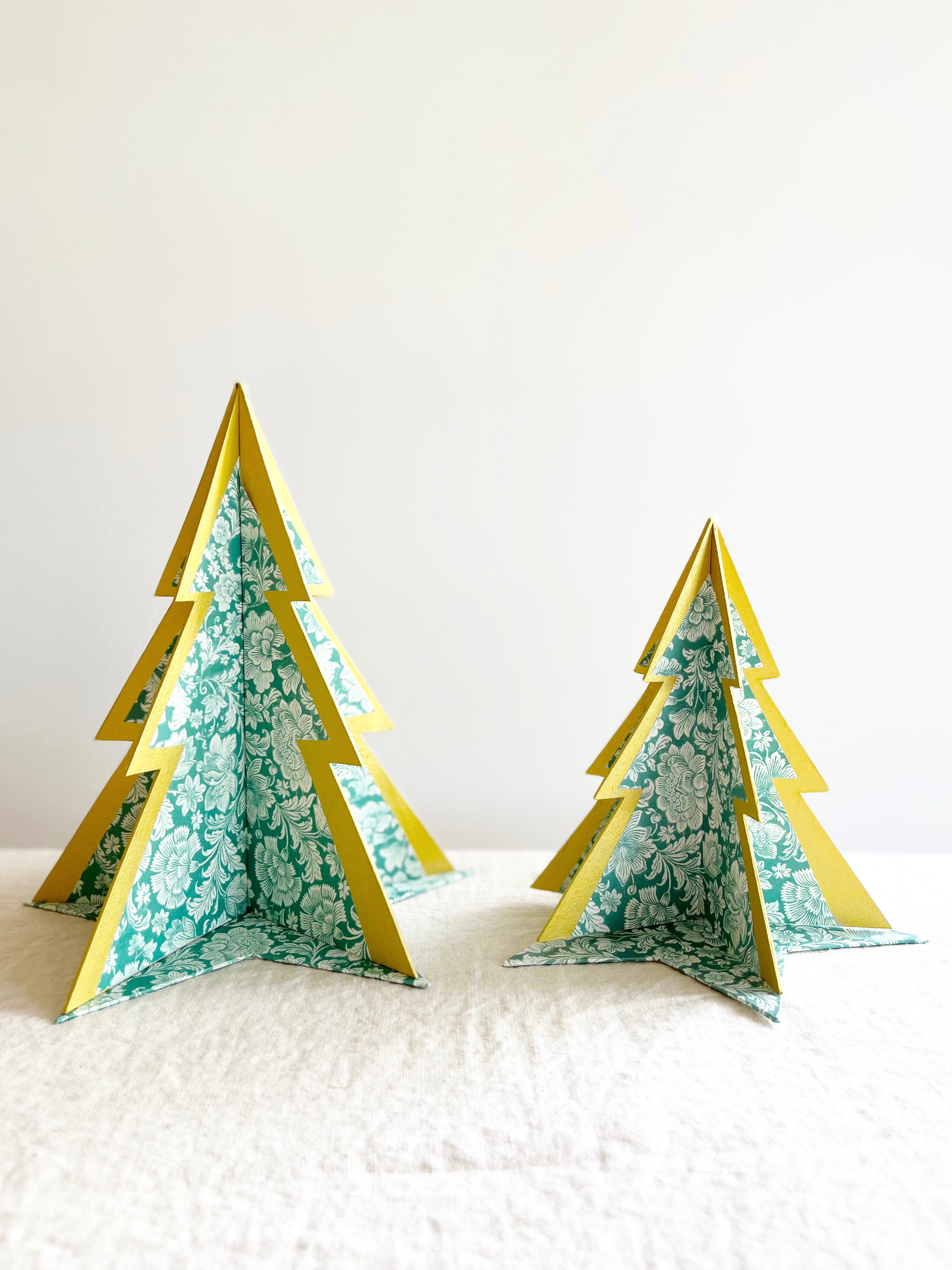 decorative paper christmas tree stand with green floral pattern