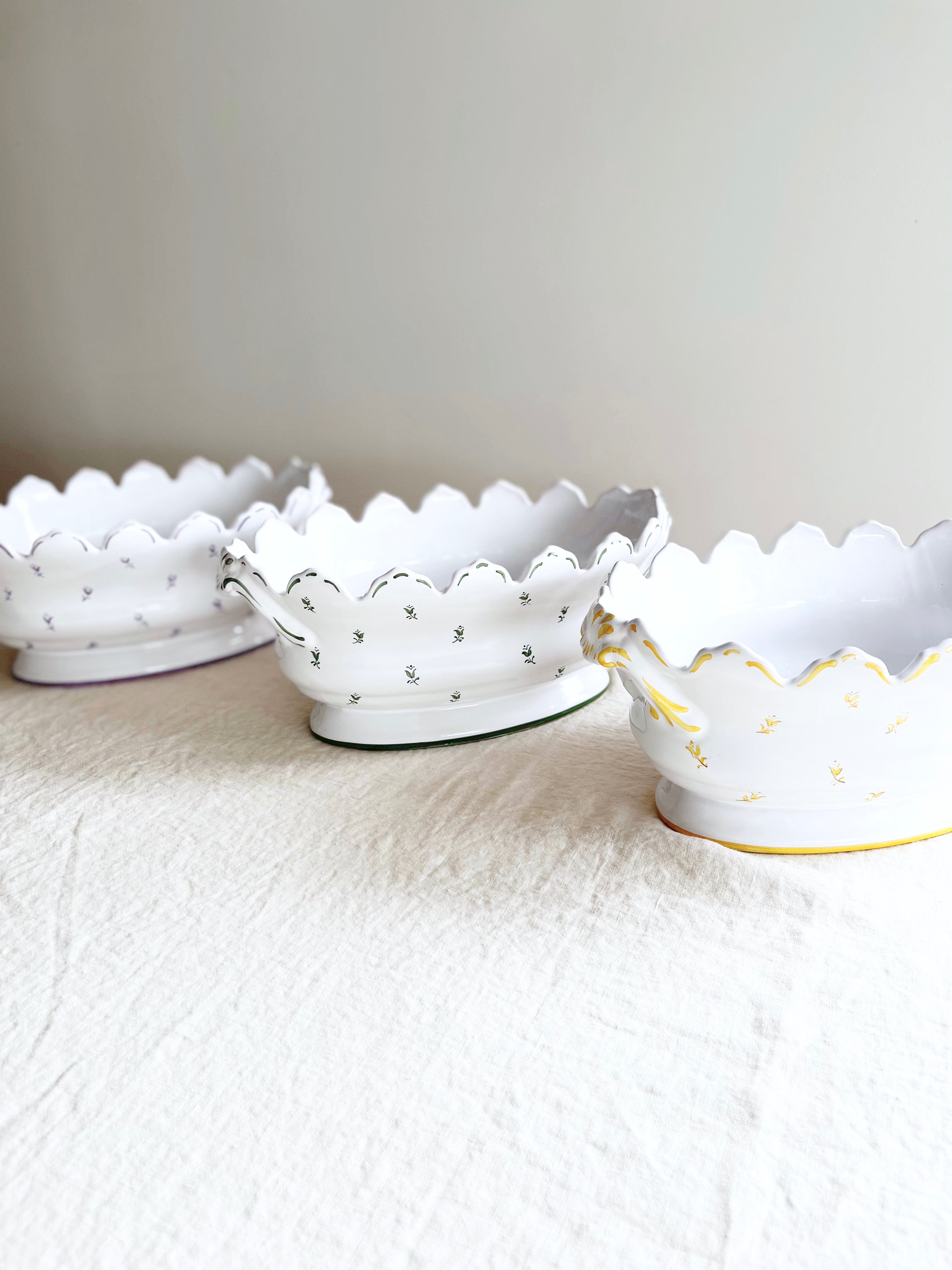 yellow and white jardiniere planters angled view