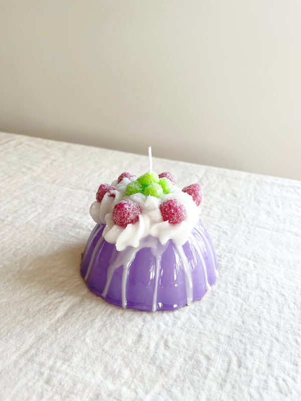 cereria introna lavender budino shaped paraffin candle on white table