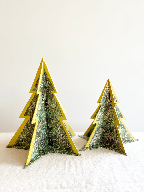 decorative paper christmas tree stands in green marbled pattern