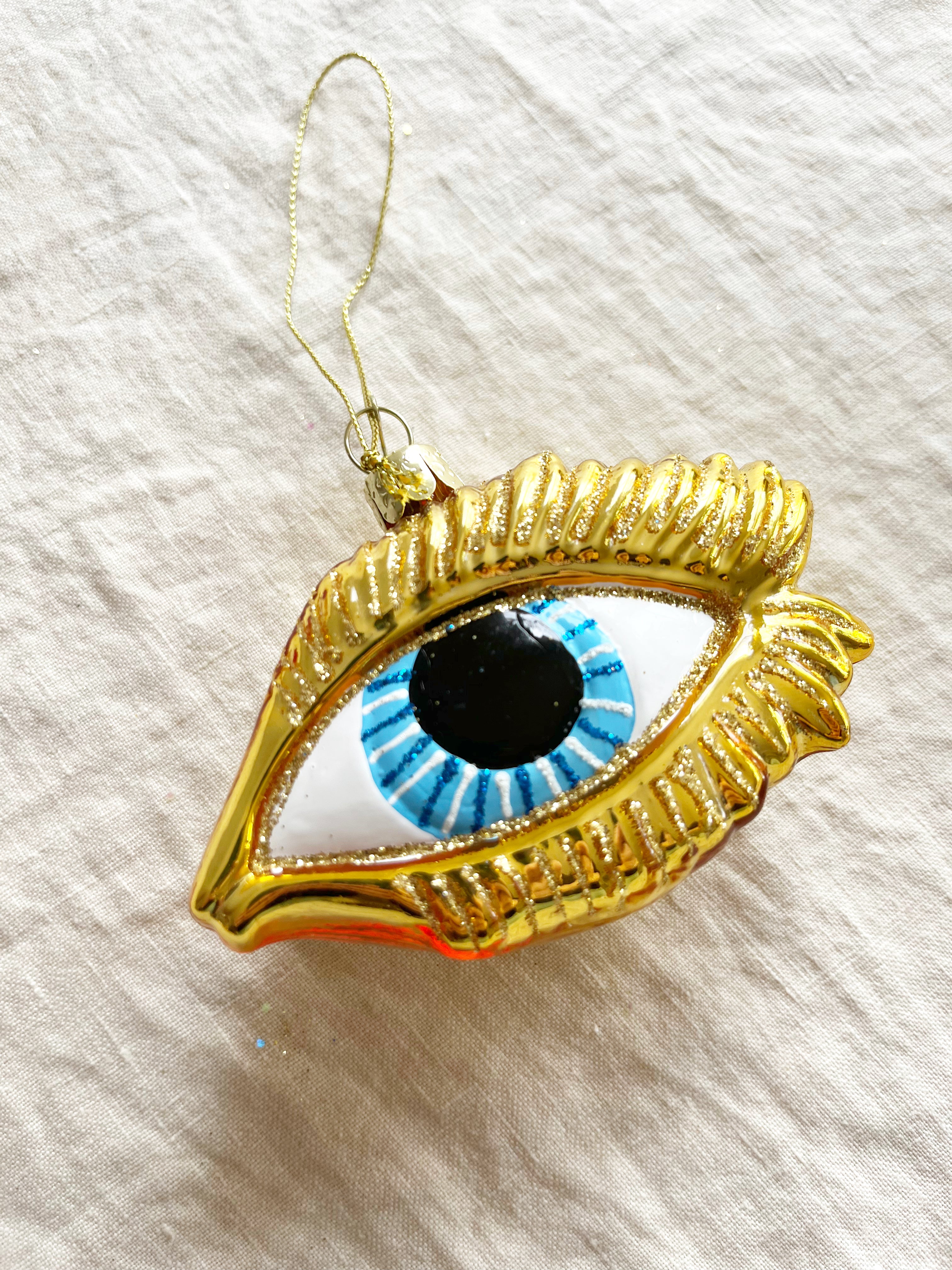 hand blown glass christmas ornament shaped like eye detail view