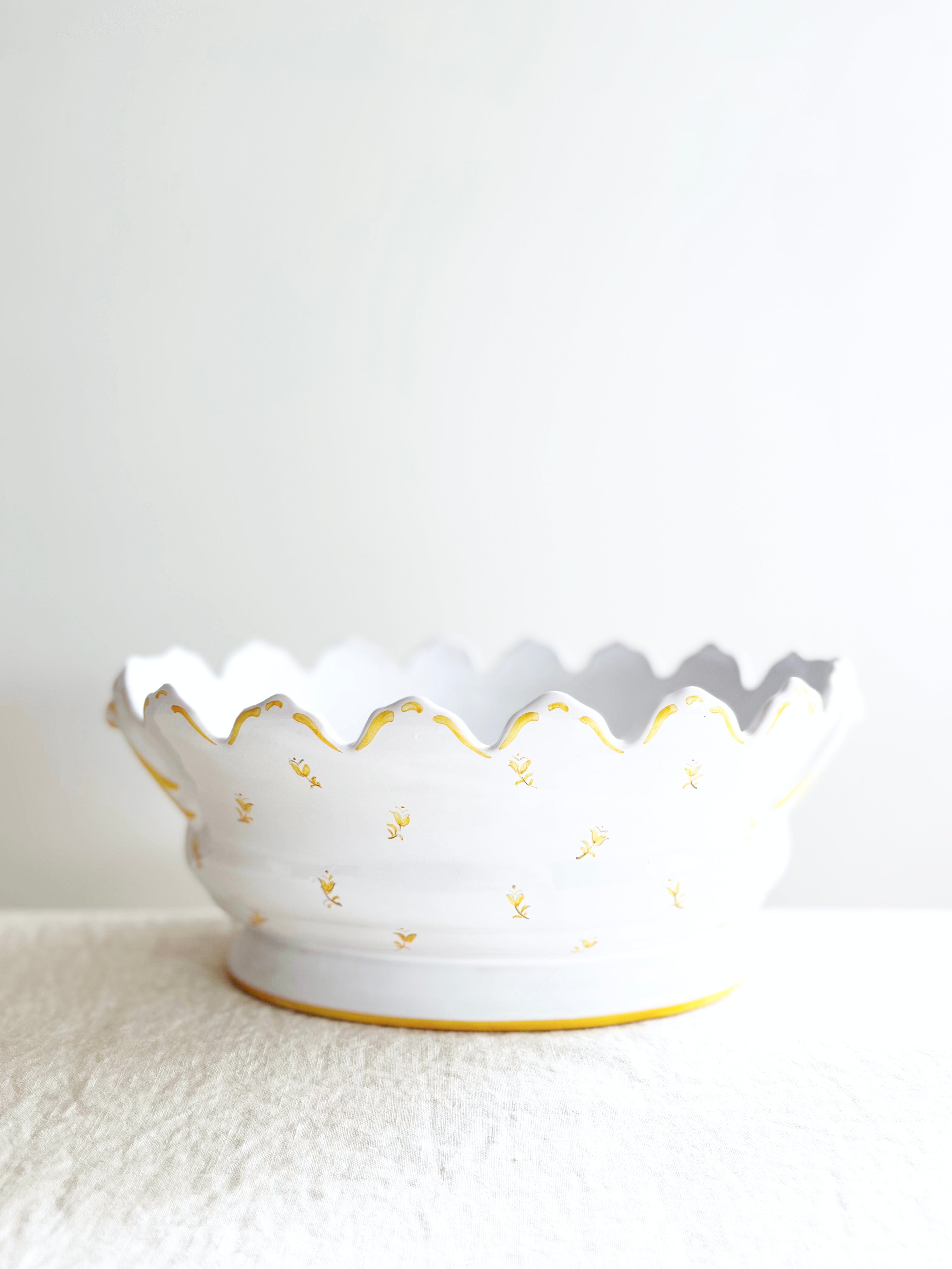 yellow and white jardiniere planter