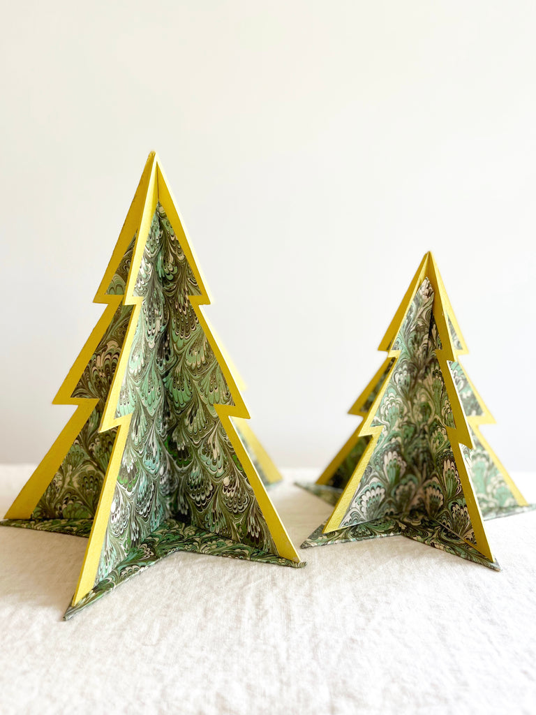 decorative paper christmas tree stands in green marbled pattern in two sizes